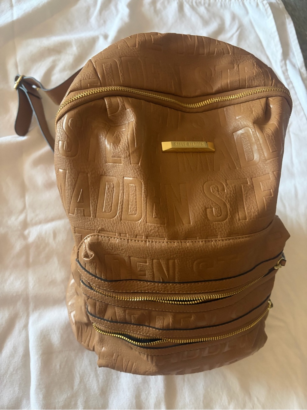 Steve Madden Cognac Embossed Logo Backpack with Gold Hardware Vegan Leather